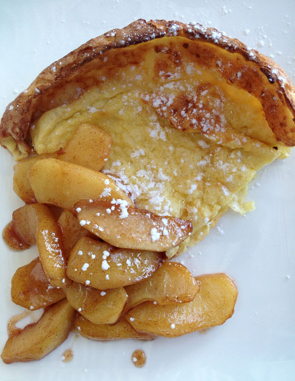 German Pancake with Cinnamon Apples topped with powdered sugar