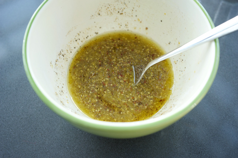 Mustard dressing mixed in a bowl