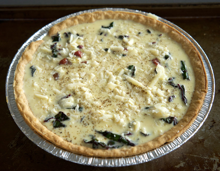 Egg mixture with cheese fills the crust to the top