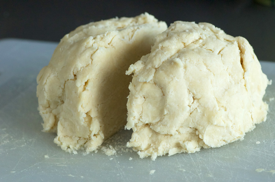 Ball of dough has been cut into two hunks