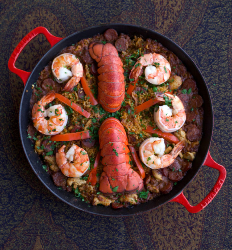 Paella with chicken, lobster and shrimp